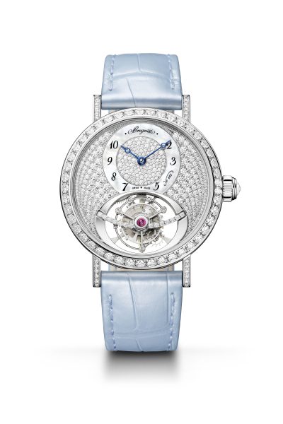 Brilliant cut diamonds adorn the watch dial bezel and lugs Brilliant cut diamonds adorn the watch dial bezel and lugs